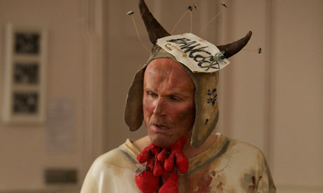 An image of Tim Crouch in the Turkey Cock costume for I, Malvolio
