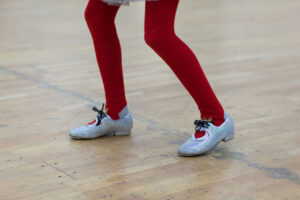 Legs and feet wearing tap shoes