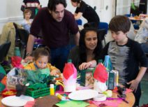 Family making crafts with environmentally friendly materials