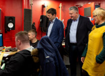 Andy Burnham - Mayor of Greater Manchester, Daren Whitaker - MD of Renaker Build Ltd and Liz O'Neill, CEO of Z-arts observe a music technology workshop
