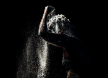 Lead image for Oreo - black and white image of a woman with white powder raining down on her