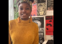 Lead image for Yemi Pop Stars Warm Up. A young woman wearing a yellow tshirt and a colourful headscarf is looking into the camera.