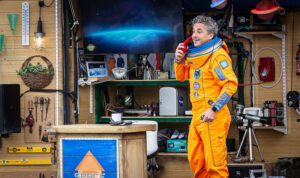 Man on phone in spacesuit