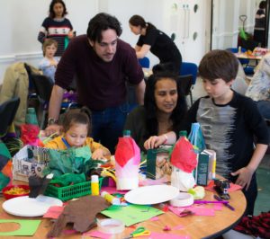 Family making crafts with environmentally friendly materials